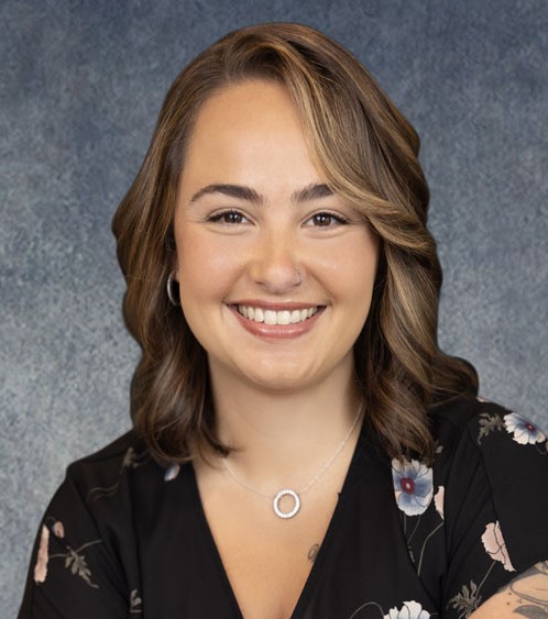 Clickable Marie Clune profile image; links to profile information